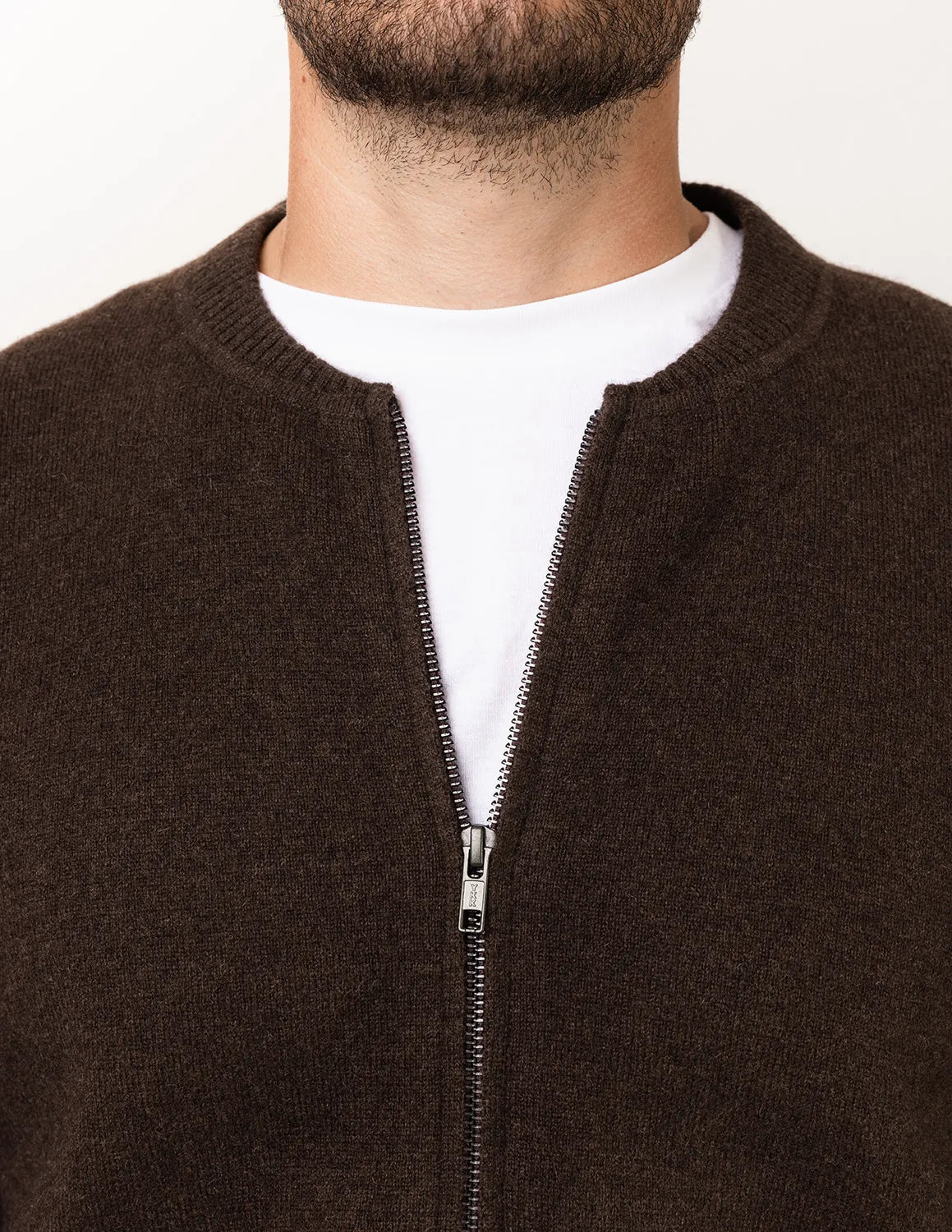 Brown zip-up sweater worn by a person on a white background - Natural Brown