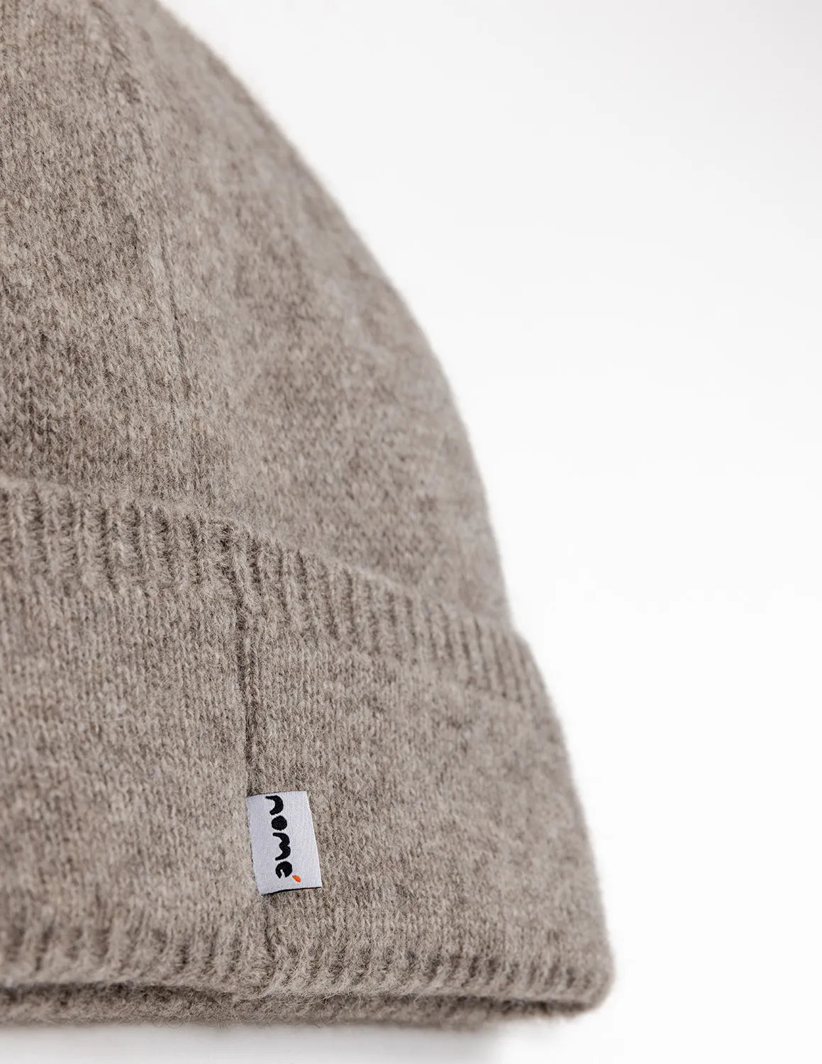 Beige knit beanie with a visible brand label on a white background - Natural Grey